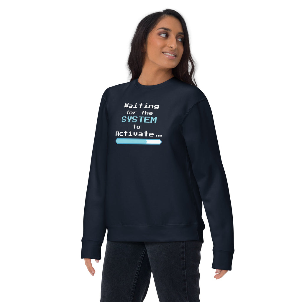 Person wearing a navy blue sweatshirt with 'Waiting for the System to Activate' text design on a white background
