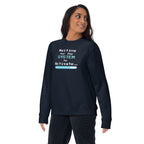 Person wearing a navy blue sweatshirt with 'Waiting for the System to Activate' text design on a white background
