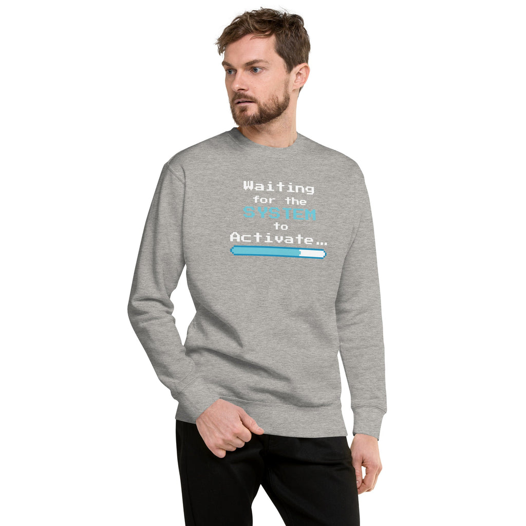 Man wearing a gray sweatshirt with 'Waiting for the System to Activate' text and loading bar design on a white background