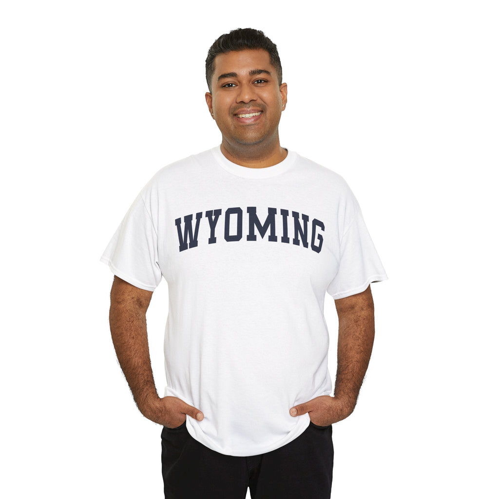 a man wearing white t-shirt with 'WYOMING' typography text on a white background 